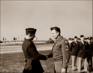 Lucera - General C. W. Lawrence presenting Bronze Star to M Sgt Franck C. Loomis Landusky 27-03-1945-.