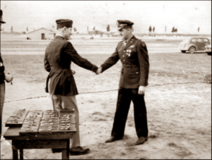 Lucera - Major Donald Ewing receiving DFC and Silver Star from Brig. General C. W. Lawrence 04-1945