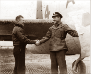Lucera - Major Donald W. Ewing Eureka, ILL.- greeted by Capt. R. Bresinger Fairfield ALA after bailing out over Ru..line