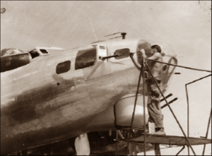 Lucera - Sgt. Montgomery cleaning aircraft guns