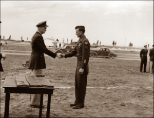Lucera - T Sgt. Clarence W. Fleming Wenston Wyo receiving Bronze star 05-1945